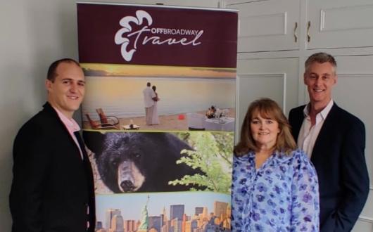 (From left) personal travel consultant Mark Beattie and Off Broadway owners Tricia Conroy Smith and Paul Rice