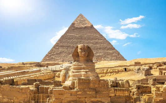 Riviera_Travel_Sphinx_and_pyramid.png