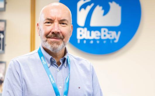 Blue Bay chief Alistair Rowland said the firm offered a 'commitment to delivering annual cost of living salary rises'