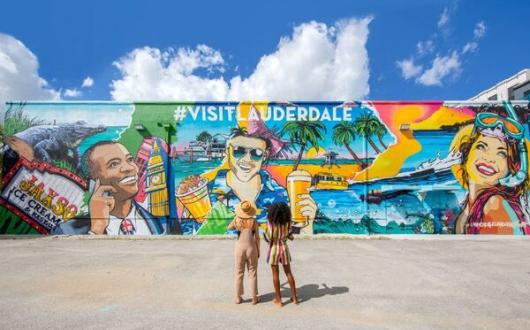 RE_Young_women_in_front_of_public_mural_in_Fort_Lauderdale_METhumb..jpg