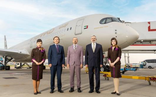 Heathrow chief commercial officer Ross Baker (second left) was among those to welcome the A350 to Heathrow
