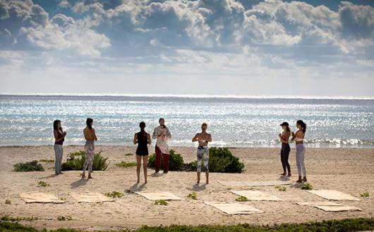 A beachside movement class at Palmaia, The House of AIA, which will host the second Synergy show