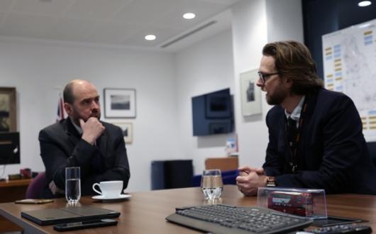 Roads and local transport minister Richard Holden with Matthew Campbell-Hill (right)