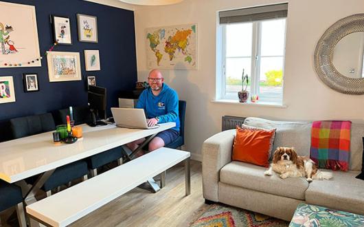 Personal Travel Agent David Russo in his home office
