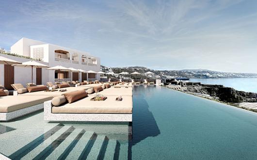 Guests can relax at the pool, looking out across the Aegean Sea