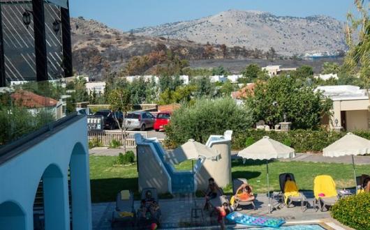 ‘In Rhodes, there is defiance – they won't be beaten by these wildfires’