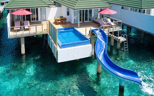 A two-bedroom Lagoon Villa with a slide at Siyam World in the Maldives