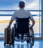 Man in wheelchair at airport