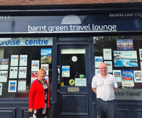 Barnt Green Travel Lounge's Linda Green and Mike Allsopp pictured outside the agency