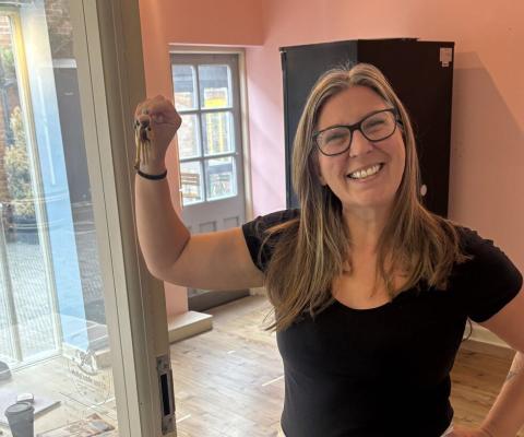 Kerry Gallagher picks up the keys to Silver Travel Advisor's second premises