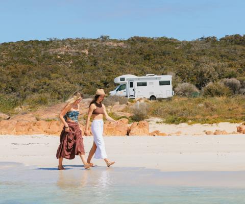 Two women exploring with their Apollo EuroDeluxe motorhome in Eagle Bay, Australia