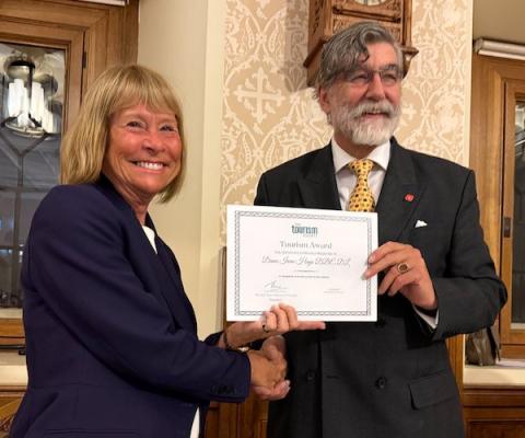 Dame Irene Hays receives the 2025 Tourism Society Award from Lord Thurso