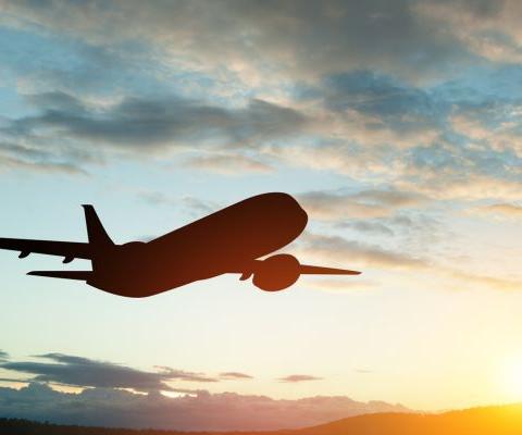 Black silhouette of plane