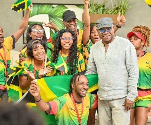 Edmund Bartlett, Jamaica's Minister of Tourism, celebrating with RIU employees