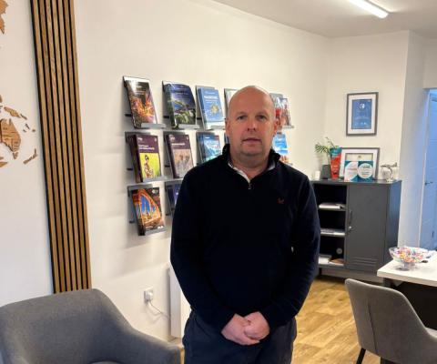 Gwyndaf Williams in his agency in Wales