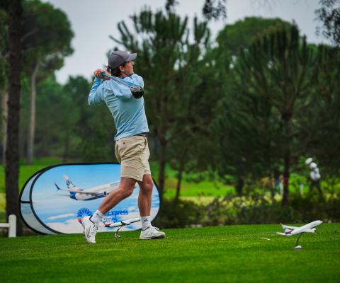 Image of Men’s Title winner, James Airey mid-golf swing