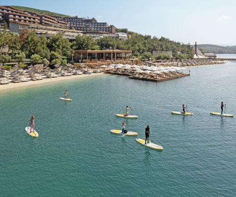 Stand-up paddleboarding at Titanic Luxury Collection Bodrum