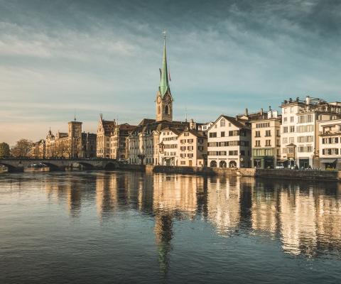 Picturesque Zurich houses and architecture alongside a river