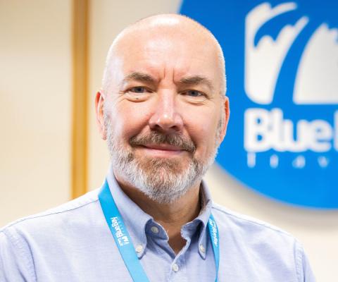 Headshot of Alistair Rowland, chief executive at Blue Bay Travel