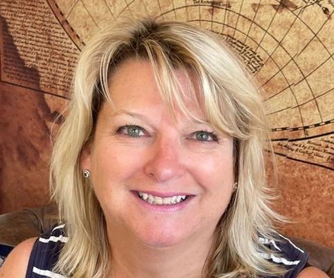 Headshot of Clare Dudley at Ponders Travel