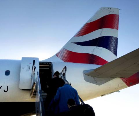 Tail of a British Airways plane during sunny day