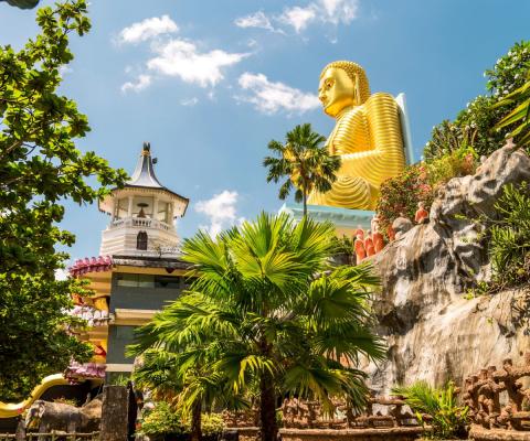 Cave temple in Dambulla, Sri Lanka with golden Buddha