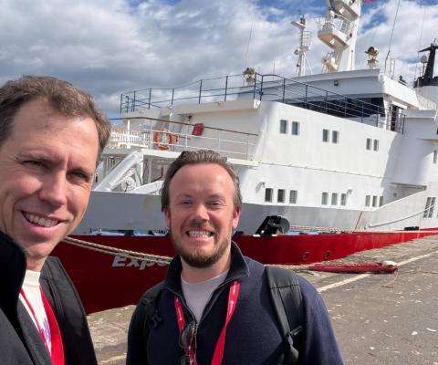 Elliott Rouse next to G Expedition