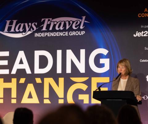 Dame Irene Hays speaking at the 2026 Hays Travel conference in Chester