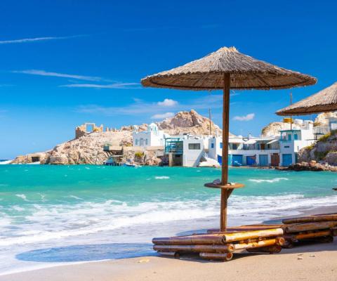 Beach and fishing village of Firapotamos on Milos island, Greece