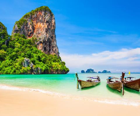 Boats moored on a beach in Thailand