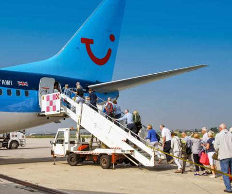 People board a Tui aircraft