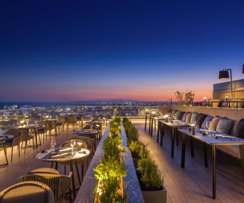 Guests can enjoy contemporary Asian cuisine at the hotel's Immenso Rooftop Restaurant