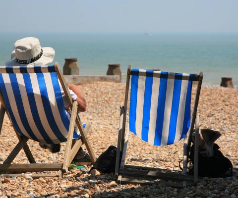Barclays said a dip in airline spending had coincided with the hot UK weather, potentially indicating a spike in staycations