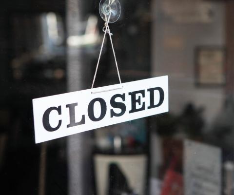 Shop closed sign in window