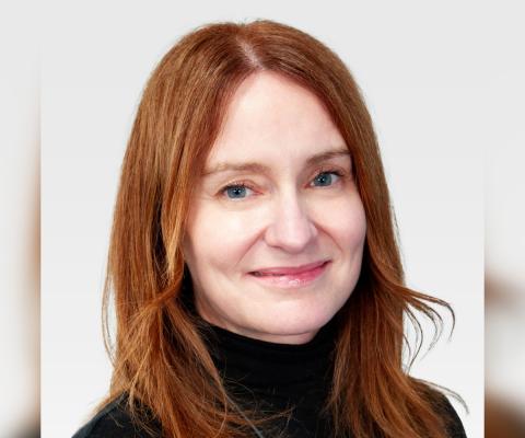 Woman with red hair smiing