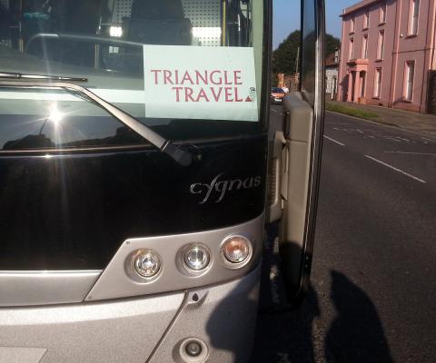 Triangle Travel coach