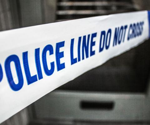 Police tape crime scene stock image.jpg