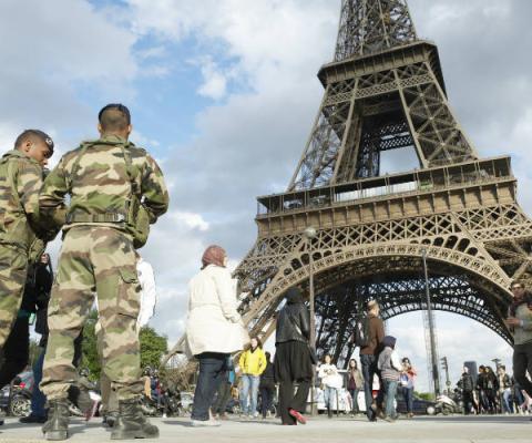 French army soldiers patrol the Eiffel Tower in Paris, terrorism