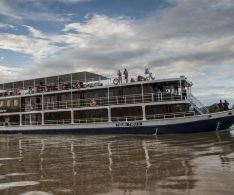 G Adventures ship in the Mekong