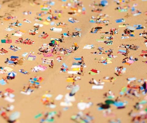 Spain beach sunbathers