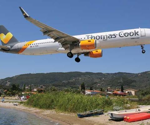 Thomas Cook jet coming in to land over beach