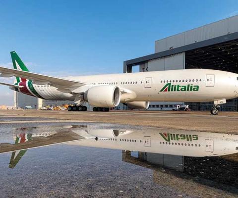 Alitalia jet by hangar