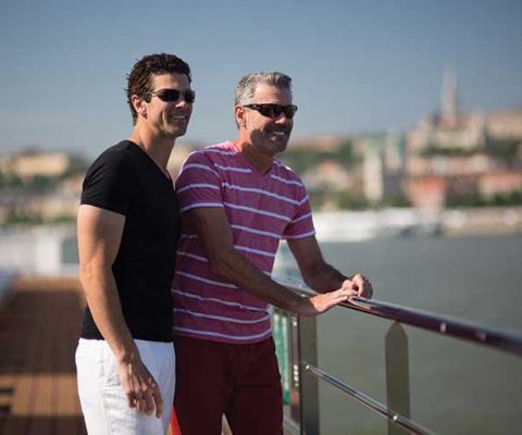 Gay couple on balcony