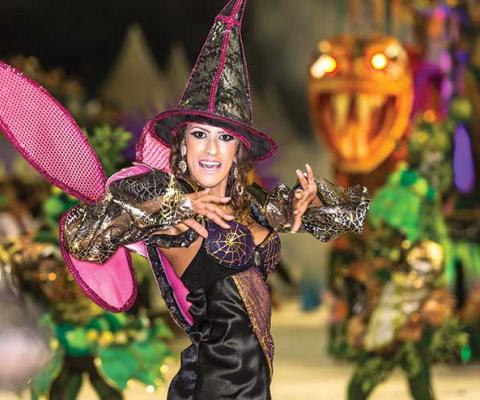 Latin lady in witch hat