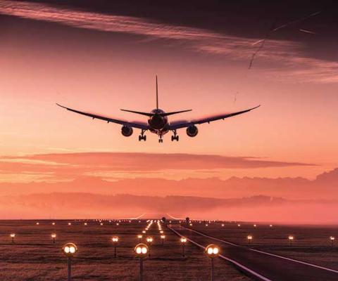 Jet airliner at sunset
