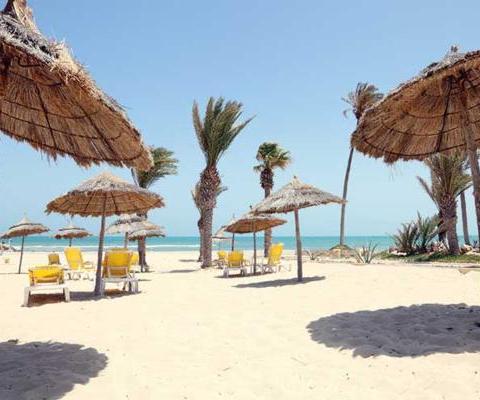 Tunisian beach, sun loungers and parasols