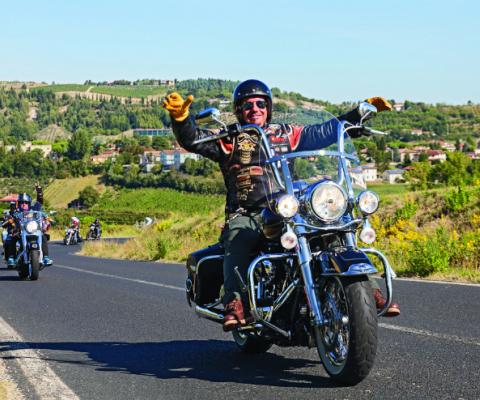 Happy Driver Riding Harley Dav Affordable Car Hire smaller.jpg
