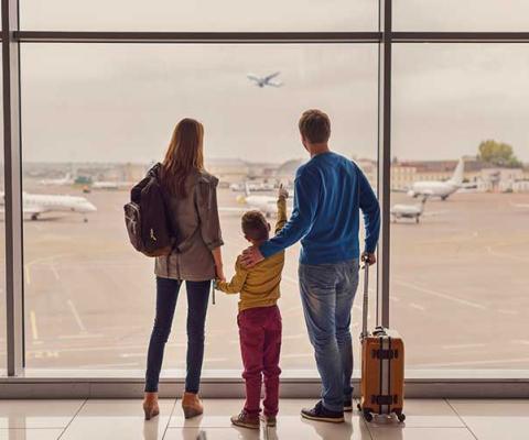 Family at airport departures