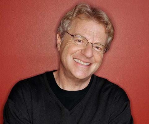 Jerry Springer in a black sweater