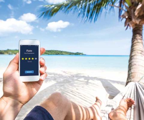 Using a smartphone on the beach